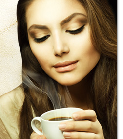 Young Girl Holding Coffee Cup